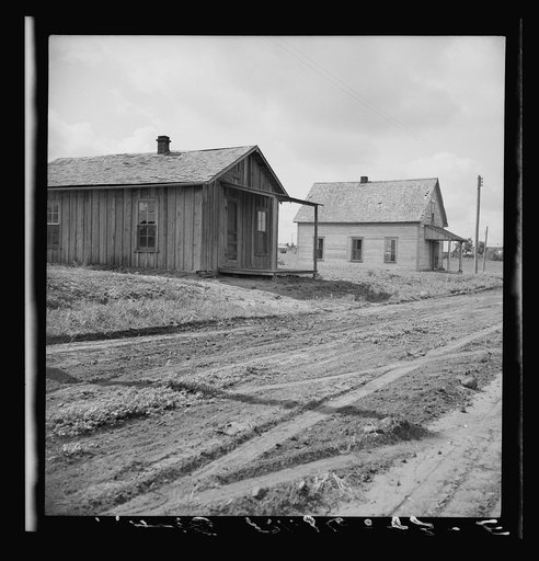 Abandoned house in Carey, Texas. Mechanized cotton farming and displacement of tenant families is fast making Carey a ghost town