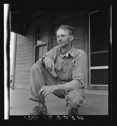 A tractor driver on a Texas cotton farm. He has a wife and two young children. The use of low paid day labor instead of tenant farmers is the rule