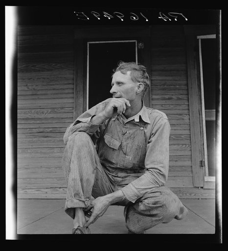 Tractor driver on cotton farm near Memphis, Texas