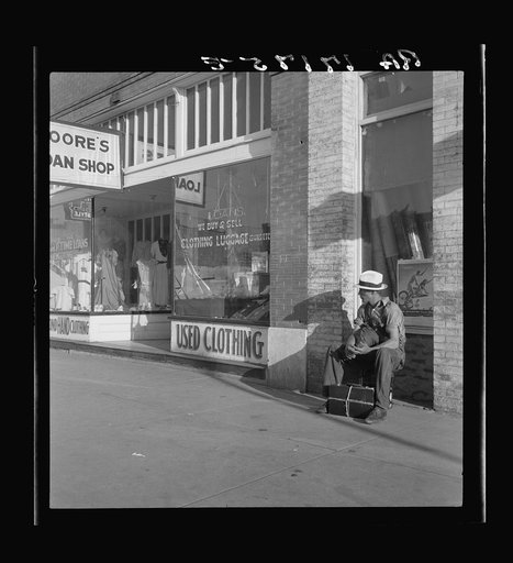 Main street storefront, Chickasaw, Oklahoma. This is a region from which hundreds of farm families have fled to the west