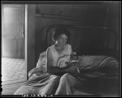 Sharecropper's wife and her youngest child. Near Cleveland, Mississippi