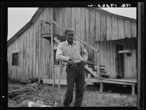 Cotton worker in Sunday clothes. Near Blytheville, Arkansas