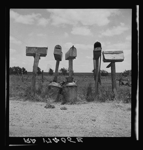 Mail boxes in Bell County, Texas. Three of these mail boxes are not in use. The tenant farmers have been replaced by tractor farming