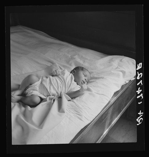 Young baby born on the Delta cooperative farm. Hillhouse, Mississippi