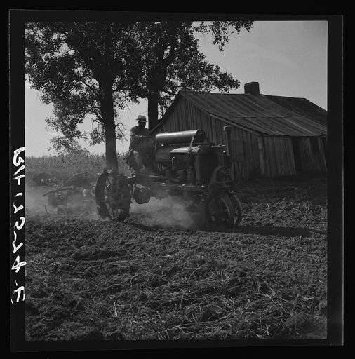 Tractor and driver on the Aldridge Plantation. Mississippi