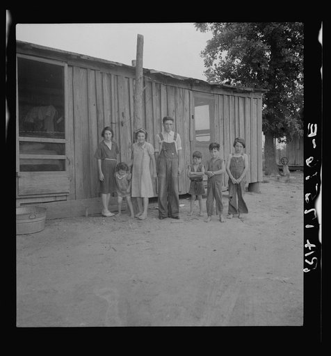 Part of a family of ten children who live and farm in the area which was flooded in the spring of 1937. They escaped in a boat