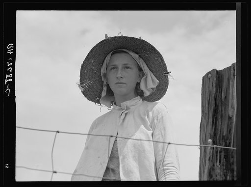 Farmer's daughter in the fields. Farm in Georgia