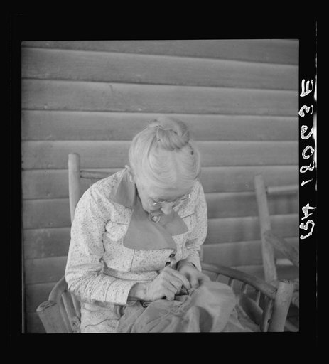 Southern lady of the old school on veranda of the "Big House" at the Wray Plantation, Georgia