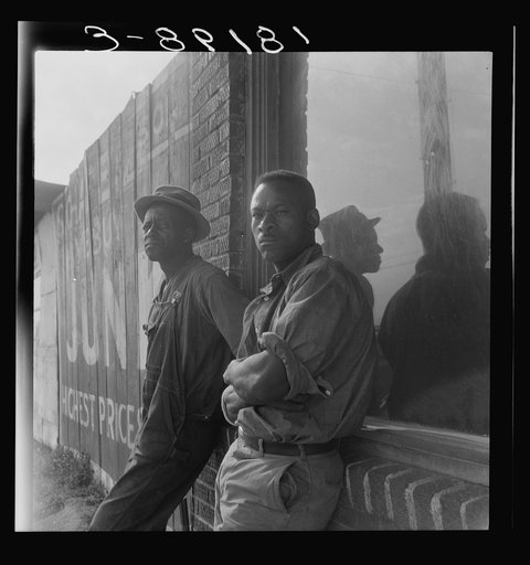 In Memphis, Tennessee hundreds of colored laborers congregated near the bridge every morning at daylight in hopes of work chopping cotton on a plantation. They are hauled to and from work on trucks. Reduced cotton acreage has made employment scarce for this class of seasonal labor in all towns. "You