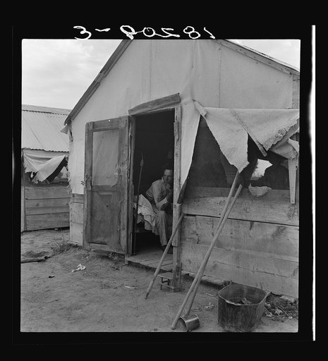 Refugee agricultural laborer on the roadside in Arizona, near the Casa Grande project (Farm Security Administration). "I was on this here project, Work Projects Administration, at twenty-three dollars and ten cents in Durant, Oklahoma. I sold a cow to get here. I'd go back tomorrow if I could. The p