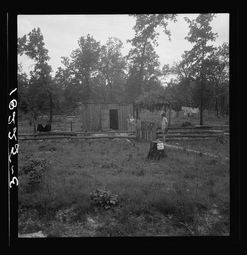Slab house in clearing east of Atoka, Oklahoma. Atoka County