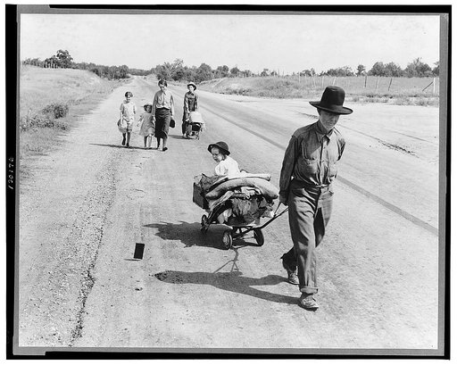 Family walking on highway, five children. Started from Idabel, Oklahoma.  Bound for Krebs, Oklahoma. Pittsburg County, Oklahoma. In 1936 the father farmed on thirds and fourths at Eagleton, McCurtain County, Oklahoma. Was taken sick with pneumonia and lost farm. Unable to get work on Work Prjects [i