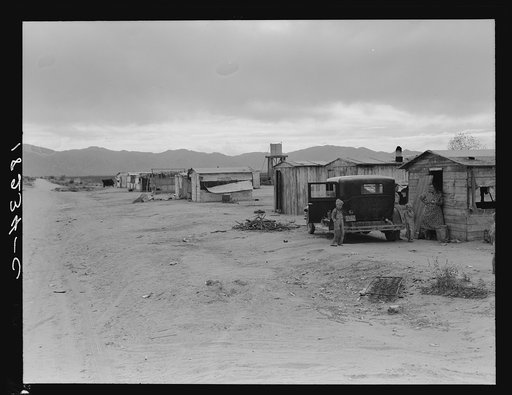 Cotton picker's camp, Salt River Valley, Arizona. For many refugees from the Southwest, Arizona is a stopping point on the way to California, where money can be made during the cotton harvest with which to continue the journey
