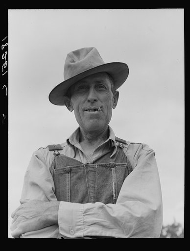 Man living on "Scratch Hill" outside Atoka, Oklahoma. Atoka County, Oklahoma. "I'm going west because this country's through, there isn't anything here for anyone. I'm going west to Lubbock and Arizona. Last year I worked in the cotton"