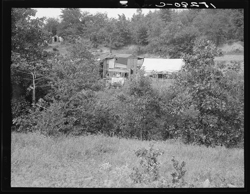 "Scratch Hill," outside Atoka, Oklahoma. Atoka County, Oklahoma. "Most of the people here have farmed, now they're on Work Projects Administration at twenty-three dollars and ten cents a month. Their hold to this country used to be timber work, but that's cut out"