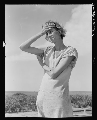 Wife of a migratory laborer with three children. Near Childress, Texas. Nettie Featherston