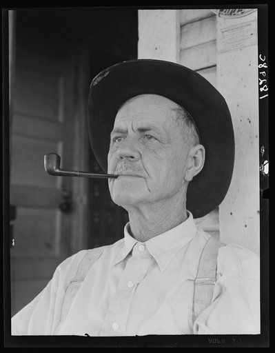 O.O. Mills, United States Postmaster at Carey. Childress County, Texas. "The tractors are keeping our families from making a living"