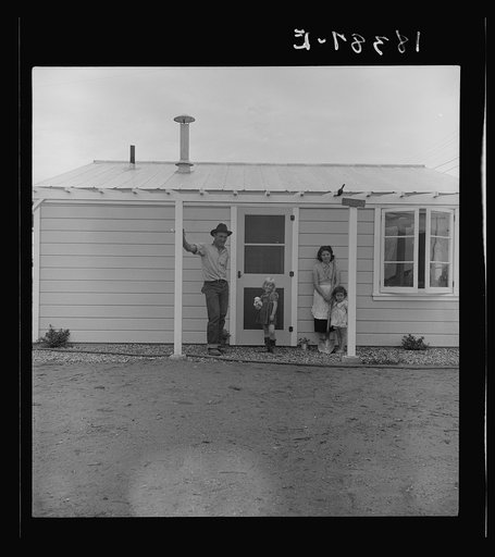 Type of house in Shafter camp for migratory workers, California. These homes represent a first step in stabilization of this group. This is the first family to be selected by Farm Security Administration for housing