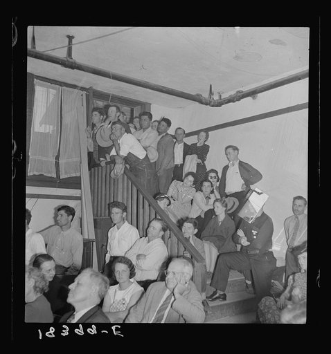 Untitled photo, possibly related to: Listening to the speaker at the conference to Aid Agricultural Organization during the cotton strike (Steinbeck Committee). Bakersfield, Kern County, California