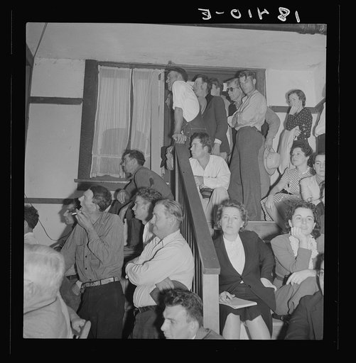 Listening to the speaker at the conference to Aid Agricultural Organization during the cotton strike (Steinbeck Committee). Bakersfield, Kern County, California