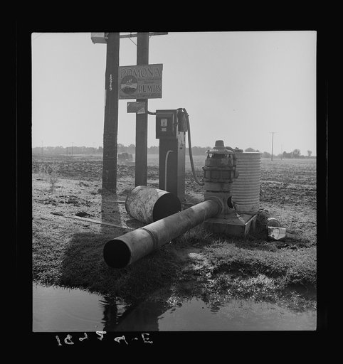 Irrigation pump on edge of field. Electric power typical of San Joaquin Valley farming. Tulare County, California