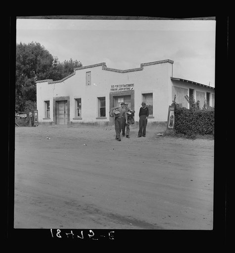 During the cotton strike, the International Labor Defense distributes clothing and shoes to destitute families of striking cotton pickers. Kern County, California