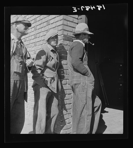 Destitute farm families come to FSA (Farm Security Administration) distributing depot to apply for food grant. Bakersfield, Kern County, California