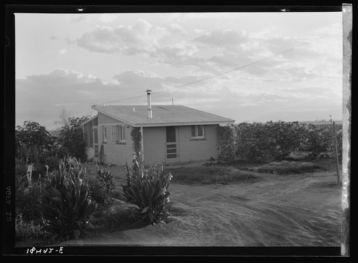 Type house at "Garden Homes," Kern County, California. Twenty such homes have been completed and are occupied on a tract adjoining the Arvin Migratory Labor Camp. Rent is eight dollars and twenty cents monthly, which includes electricity and water