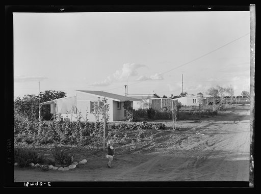 Untitled photo, possibly related to: Type house at "Garden Homes," Kern County, California. Twenty such homes have been completed and are occupied on a tract adjoining the Arvin Migratory Labor Camp. Rent is eight dollars and twenty cents monthly, which includes electricity and water