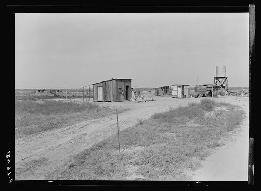 Home of rural rehabilitation client. Tulare County, California. They bought twenty acres of raw unimproved land with a first payment of fifty dollars which was money saved out of relief budget (August 1936). They received a FSA (Farm Security Administration) loan of seven hundred dollars for stock a