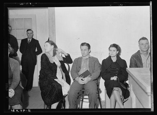 Night meeting in the Farm Security Administration office, Rural Rehabilitation Division, Visalia, Tulare County, California. 144 families have applied for farm purchase loans under the Farm Tenancy Act, passed by Congress in 1937. Ten applicants from this region of four counties will be finally sele