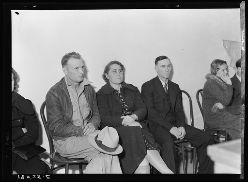 Night meeting in the Farm Security Administration office, Rural Rehabilitation Division, Visalia, Tulare County, California. 144 families have applied for farm purchase loans under the Farm Tenancy Act, passed by Congress in 1937. Ten applicants from this region of four counties will be finally sele