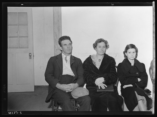Night meeting in the Farm Security Administration office, Rural Rehabilitation Division, Visalia, Tulare County, California. 144 families have applied for farm purchase loans under the Farm Tenancy Act, passed by Congress in 1937. Ten applicants from this region of four counties will be finally sele