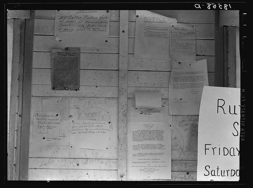 Untitled photo, possibly related to: Campers' bulletin board near entrance of Shafter camp for migrant workers. California