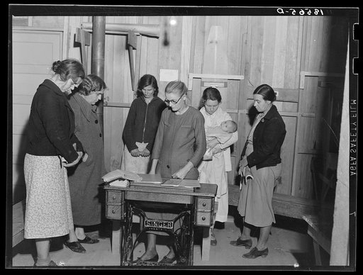 Meeting of the Mothers' Club in Arvin camp for migrant workers, Farm Security Administration (FSA) camp in California, opens with prayer