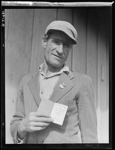 From Oklahoma farm (April 1938) to strike leader in California. Cotton strike (Nov. 1938). He displays his union membership book. "Vote No on No. 1" refers to proposed anti-picketing law which was later defeated by California electorate. Kern County, California