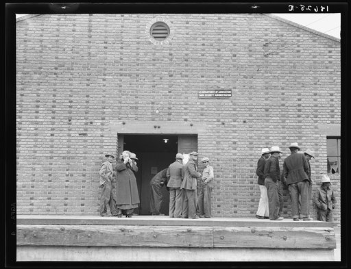 Untitled photo, possibly related to: Warehouse, used as distributing office for Farm Security Administration (FSA) relief grants of commodities to destitute farm labor families during cotton strike of October 1938. Bakersfield, California