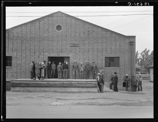 Warehouse, used as distributing office for Farm Security Administration (FSA) relief grants of commodities to destitute farm labor families during cotton strike of October 1938. Bakersfield, California