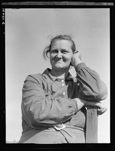 Arkansas mother come to California for a new start, with husband and eleven children. Now a rural rehabilitation client. Tulare County, California