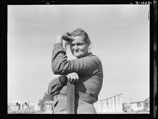 Arkansas mother come to California for a new start, with husband and eleven children. Now a rural rehabilitation client. Tulare County, California