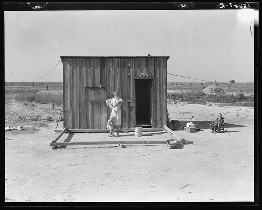Home of rural rehabilitation client, Tulare County, California. They bought twenty acres of raw unimproved land with a first payment of fifty dollars which was money saved out of relief budget (August 1936). They received a Farm Security Administration (FSA) loan of seven hundred dollars for stock a