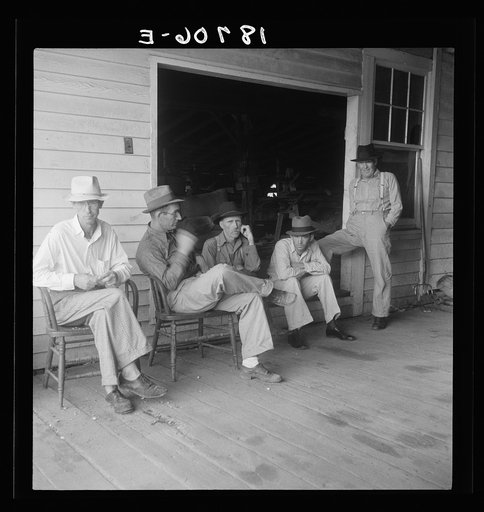 South Carolina. Livery stable gang talking politics in the country of Senator "Cotton Ed" Smith