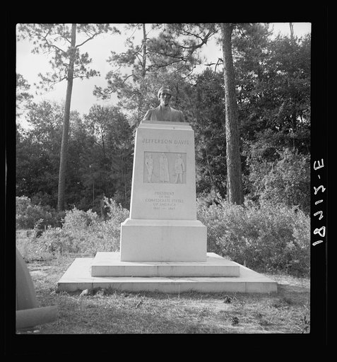 Untitled photo, possibly related to: Monument on eighty-acre state memorial park, Jefferson Davis Park, bound on three sides by Irwinville Farms, Georgia, property. Memorial marks spot where Jefferson Davis was captured by Union Soldiers on May 10, 1865. Monument erected by United Daughters of the C