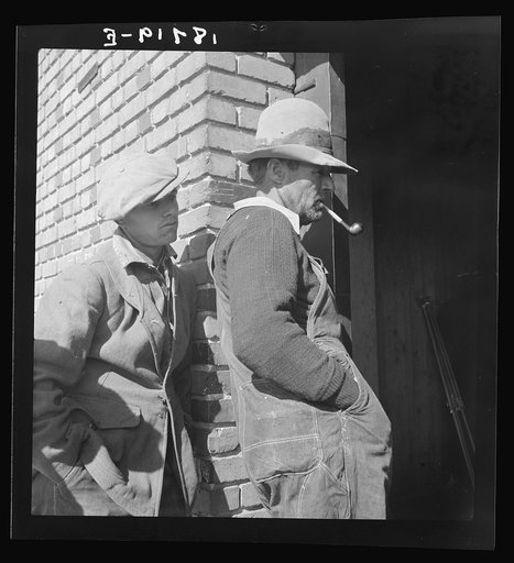 Warehouse used as distributing office for Farm Security Administration (FSA) relief grants of commodities to destitute farm labor families. Bakersfield, California