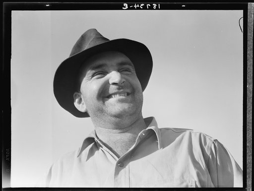 Untitled photo, possibly related to: November 17, 1938. Near Stockton, California. One of six successful applicants out of seventy-five. Purchasing farm under Bankhead-Jones Act. "When a feller is in it for himself, if he makes it, it's his. If he don't make it, it's his fault alone"