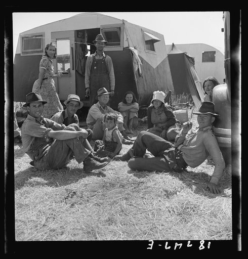 Westley, California. Migrant family in Farm Security Administration camp. Unable to obtain work in pea fields because of labor surplus in height of season