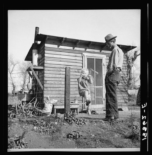 Madera County, family from near Dallas, Texas. Rent is five dollars a month. "There's no future here. I've been following the work (migratory labor) but there's no chance for a fellow to get a holt hisself in this country. The last job I had is tractor driving for thirty-five cents an hour. Had that