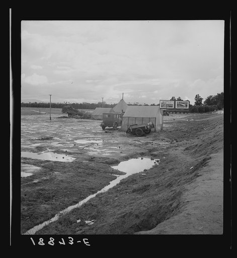 Untitled photo, possibly related to: Tulare County. Winter quarters, migratory agricultural workers. Beside the highway. Tulare County, California