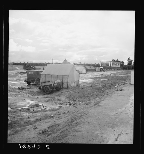 Tulare County. Winter quarters, migratory agricultural workers. Beside the highway. Tulare County, California