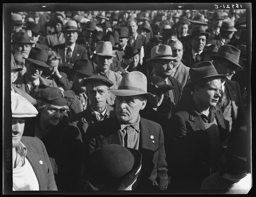 Untitled photo, possibly related to: Listening to speeches at mass meeting of Works Progress Administration (WPA) workers protesting congressional cut of relief appropriations. San Francisco, California